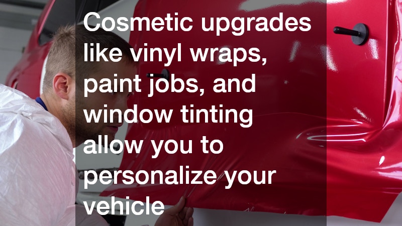 man installing a red vinyl wrap on a vehicle